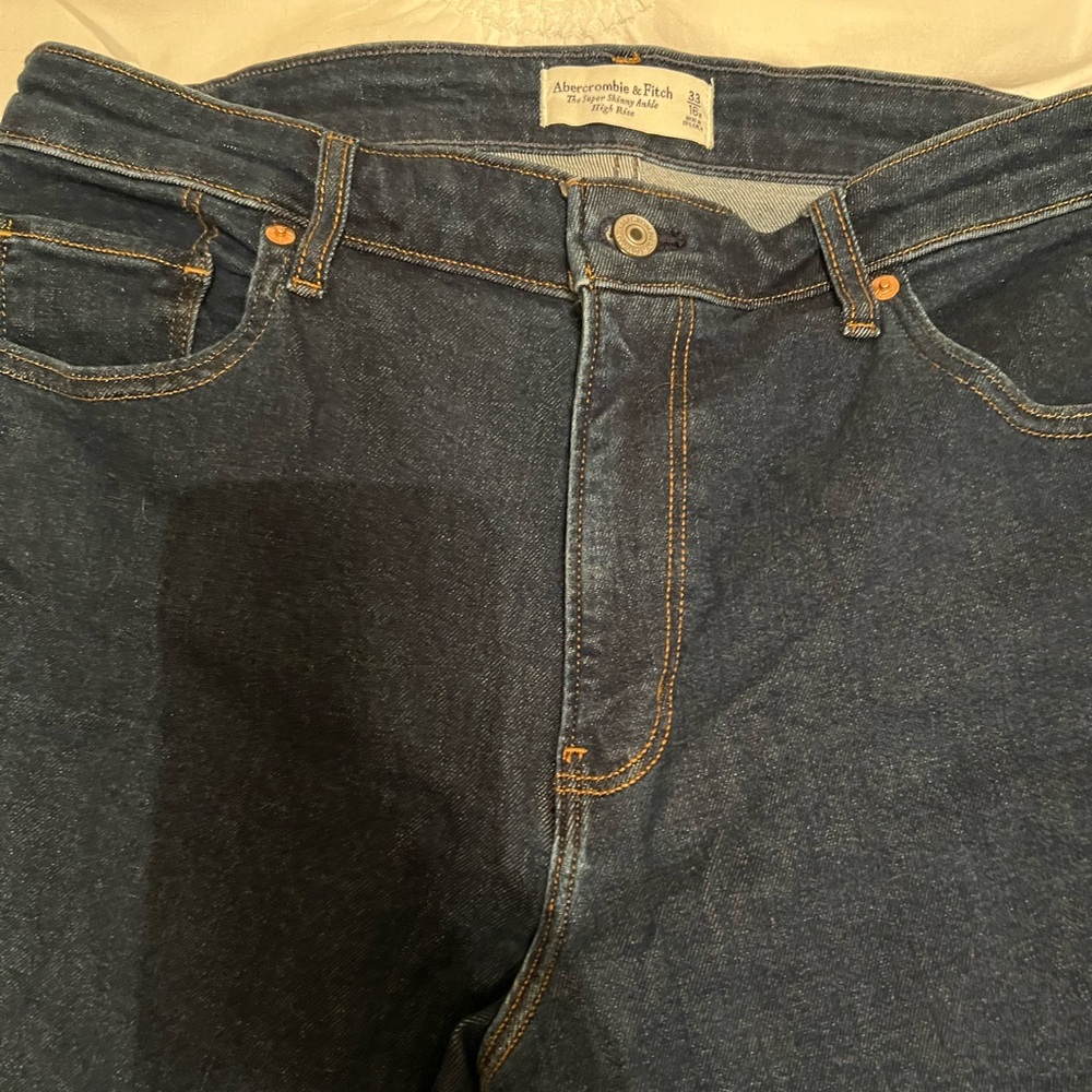Abercrombie and Fitch Women's Super Skinny High Rise Jeans in dark wash. - Picture 3 of 8